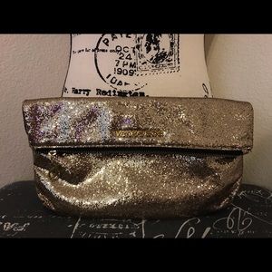 Victoria’s Secret glittery gold clutch